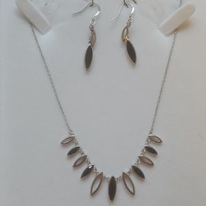 Silver necklace and earrings